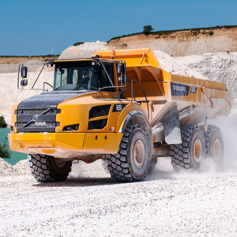 Operate an articulated dump truck